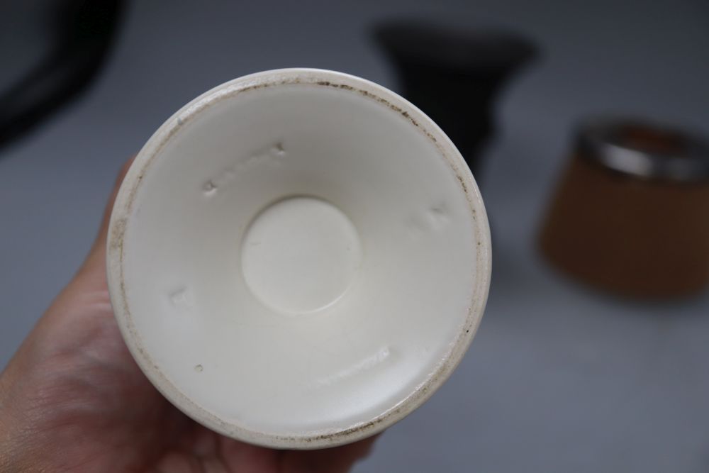 An Asprey silver mounted match-strike, a Wedgwood jar and a Wedgwood black basalt jar (3)